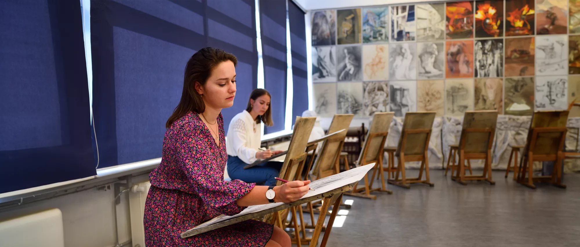 Students working on their sketches in the drawing studio. 