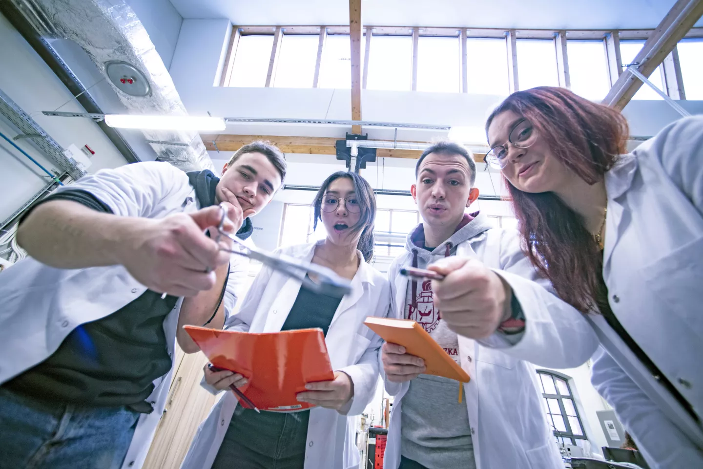 A group of students in a laboratory. 