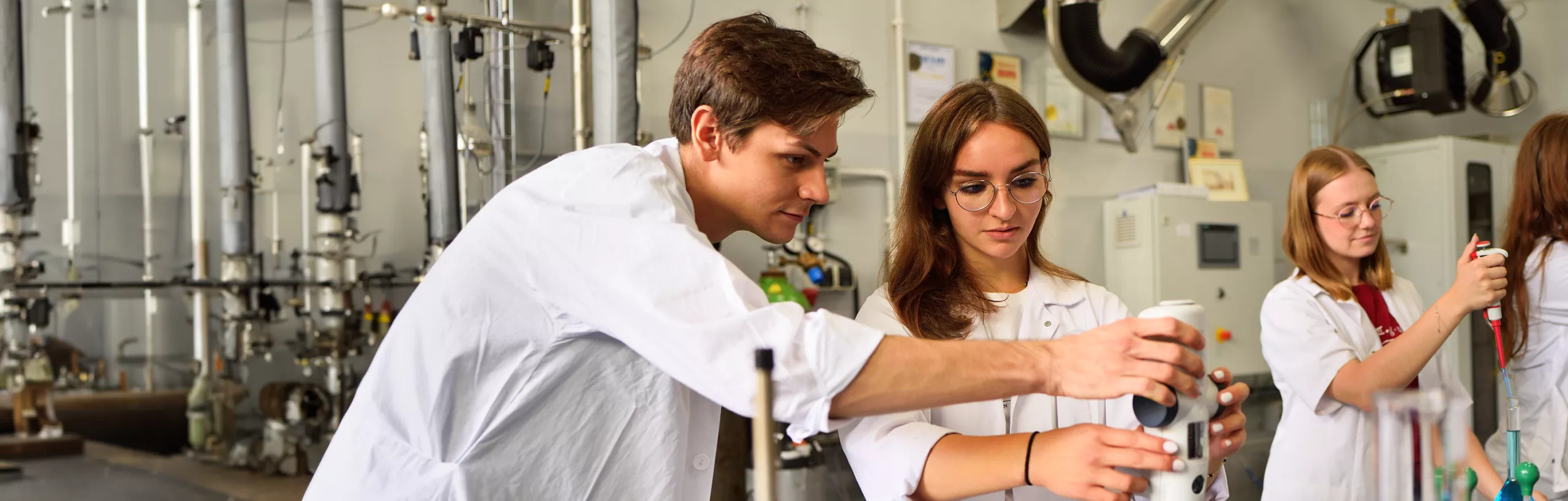 Students working on an experiment in a laboratory. 